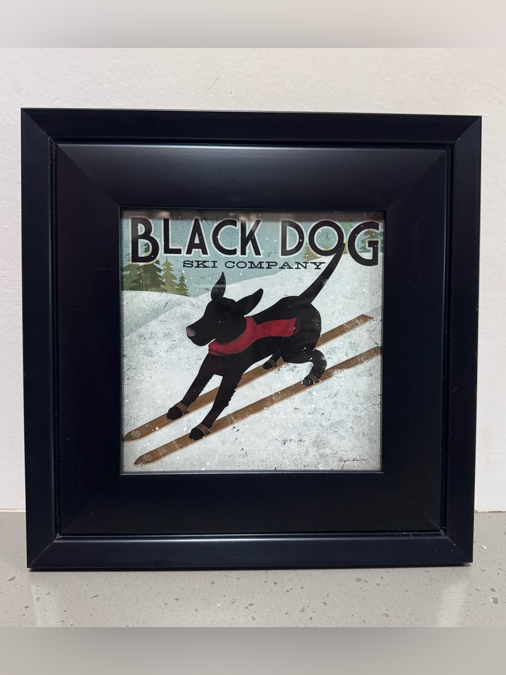“Black Dog Ski Company” Framed Print by Ryan Fowler — Charming Gift for Dog Love